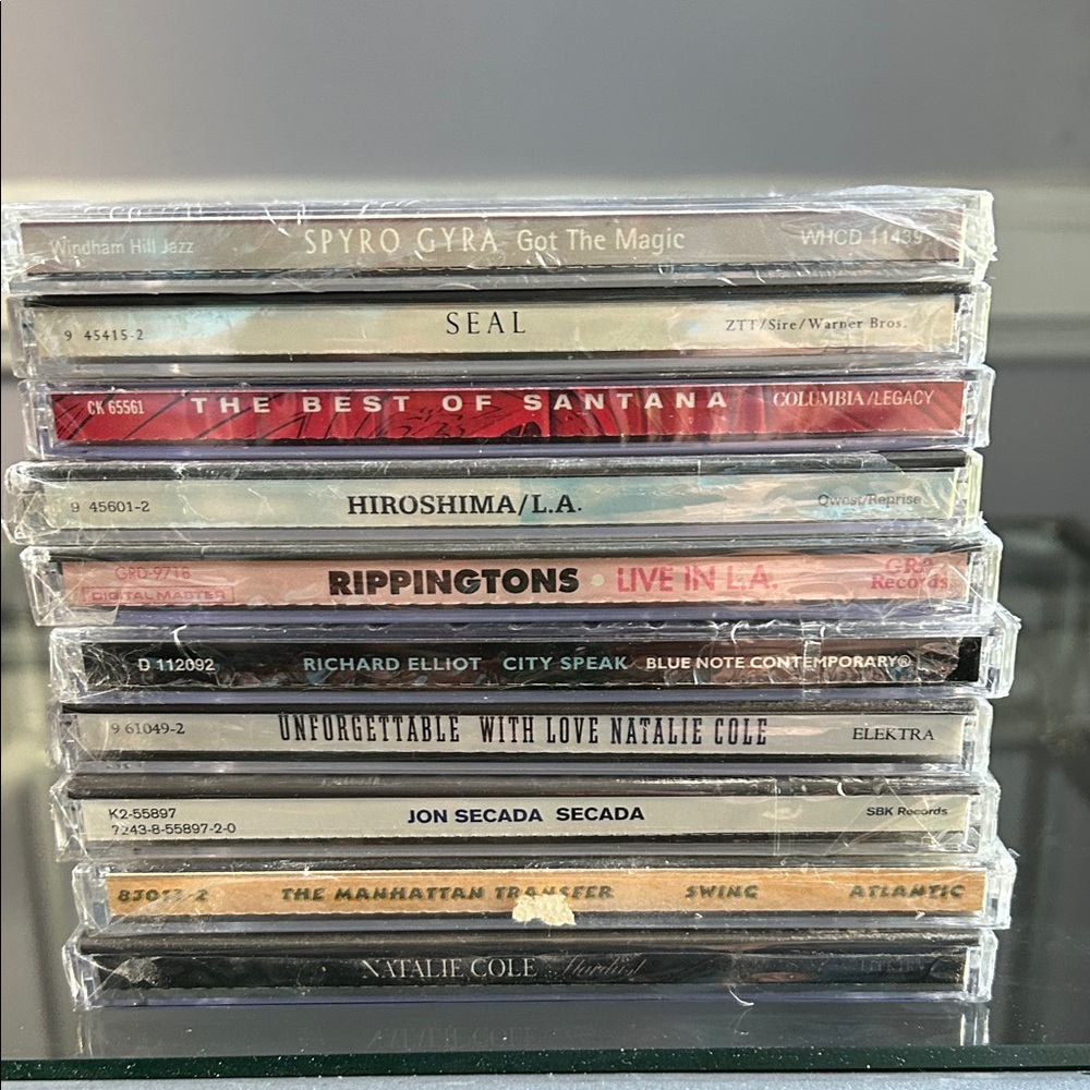 10 Music CDs New in shrink wrap Natalie Cole Seal Santana Manhattan Transfer etc